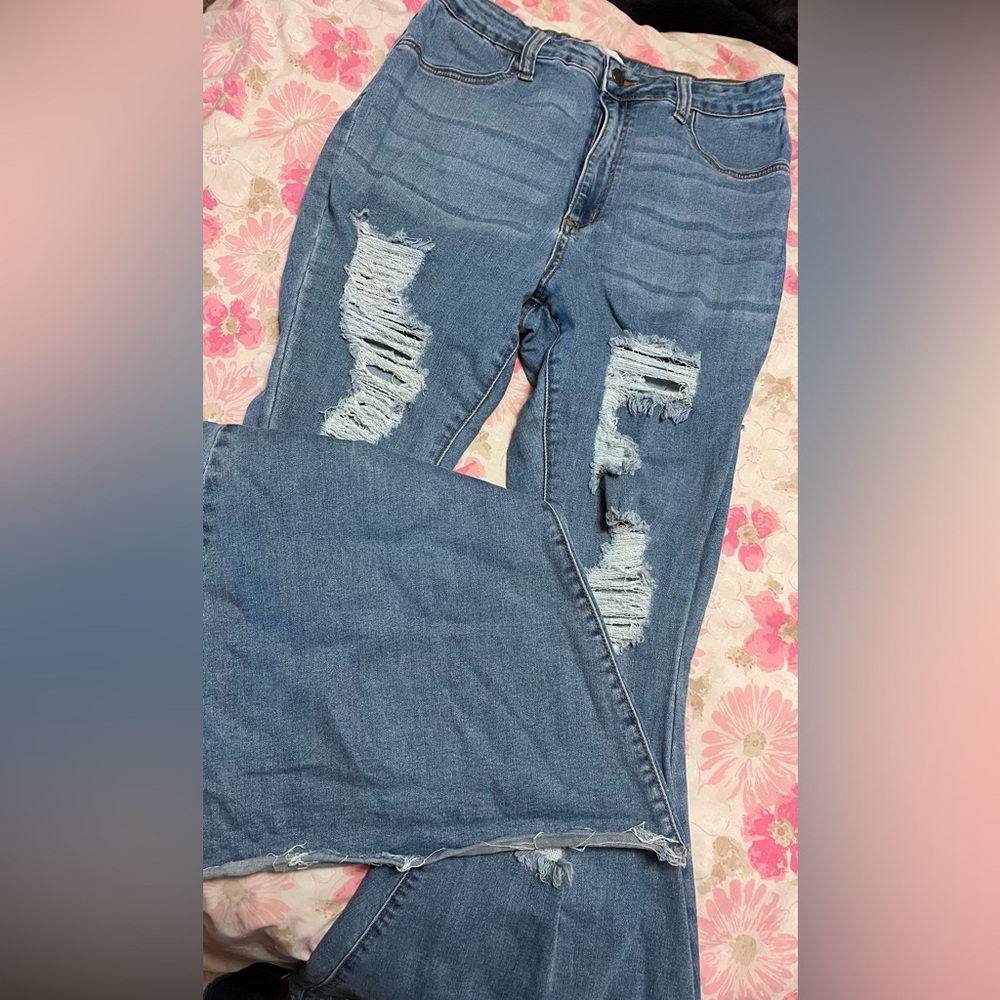 Women’s size 15 large bell bottom distressed jeans, very stretchy